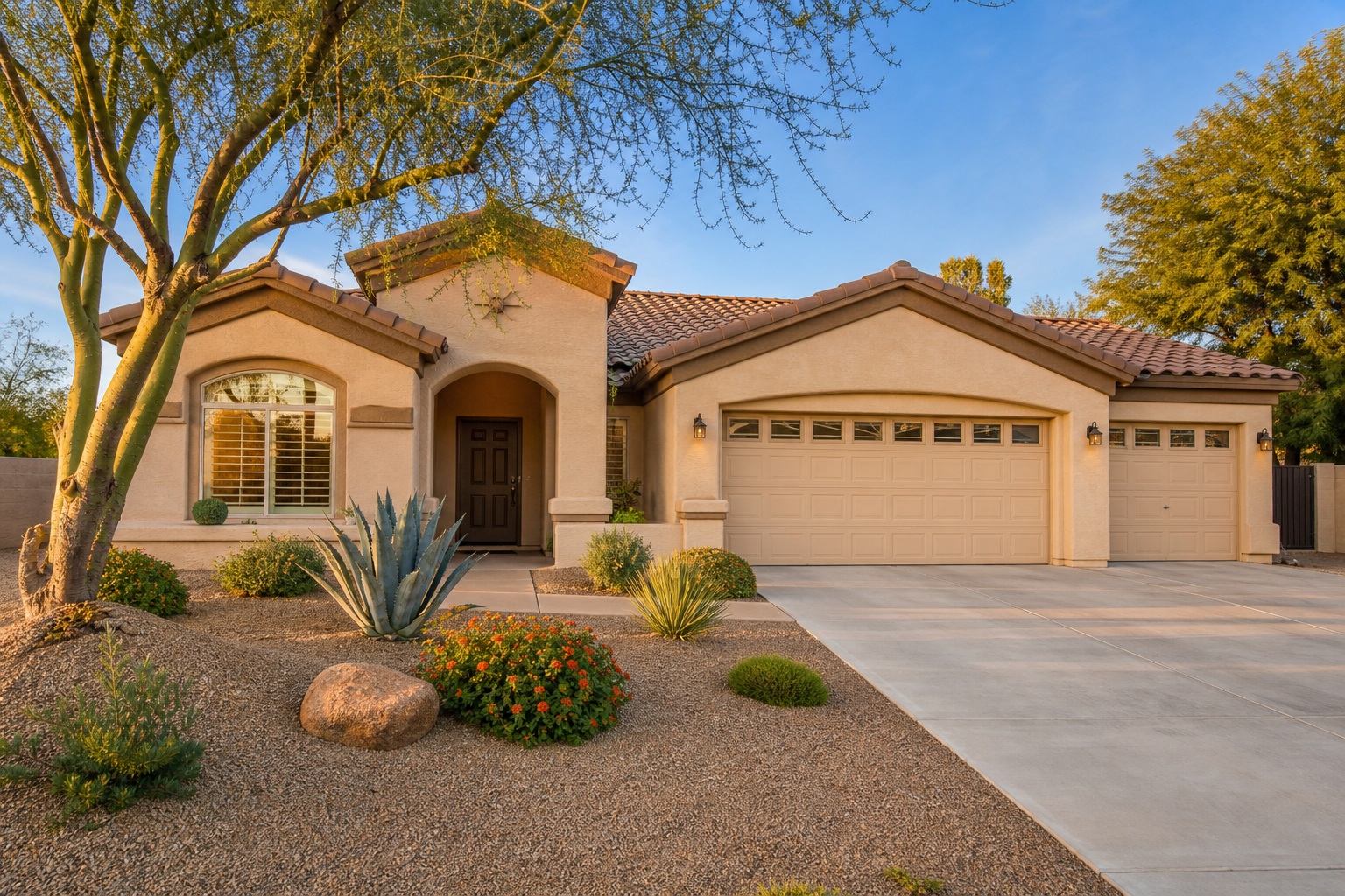 Well-kept Arizona stucco home with fresh desert landscaping, showing ways to increase home value Arizona before selling