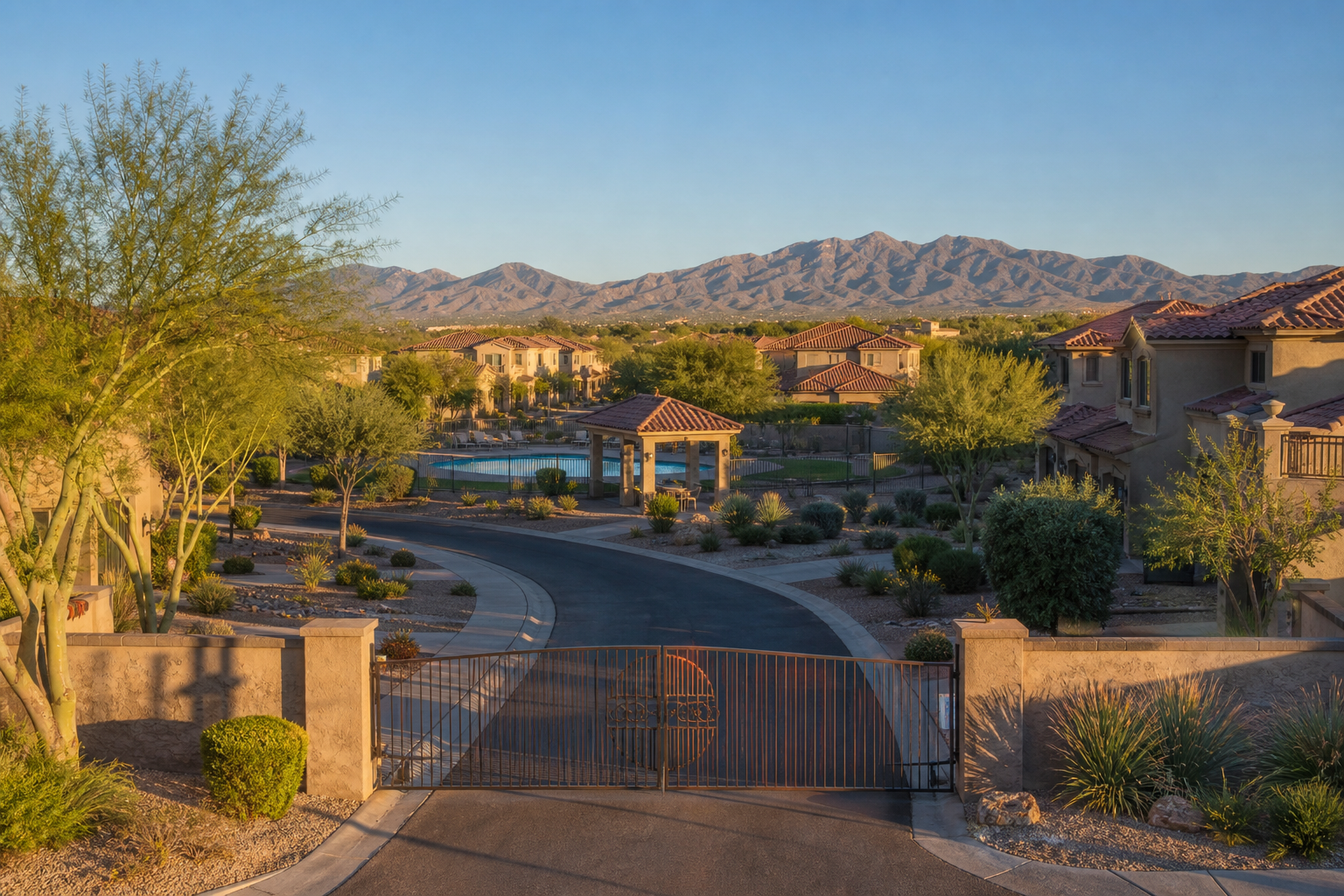 Gated Arizona master-planned community with shared pool and desert landscaping illustrating HOA rules Arizona buyers should know
